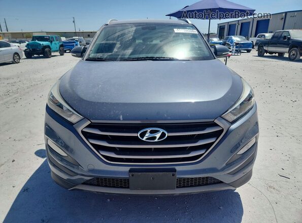 KM8J33A28GU047854 2016 HYUNDAI TUCSON Gray წინა ხედი