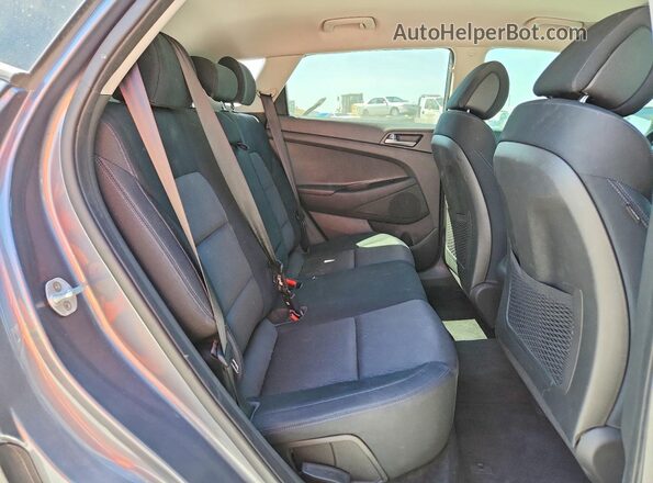 KM8J33A28GU047854 2016 HYUNDAI TUCSON Gray უკანა სალონის ხედი