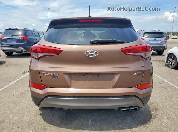 KM8J33A28GU061754 2016 HYUNDAI TUCSON Brown Հետևի տեսք