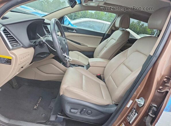 KM8J33A28GU225522 2016 HYUNDAI TUCSON Tan Вид салону спереду