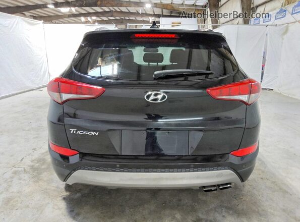 KM8J33A29JU764111 2018 HYUNDAI TUCSON Black Widok z tyłu