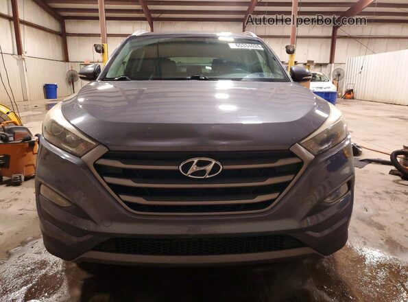KM8J33A2XGU039271 2016 HYUNDAI TUCSON Gray Widok z przodu