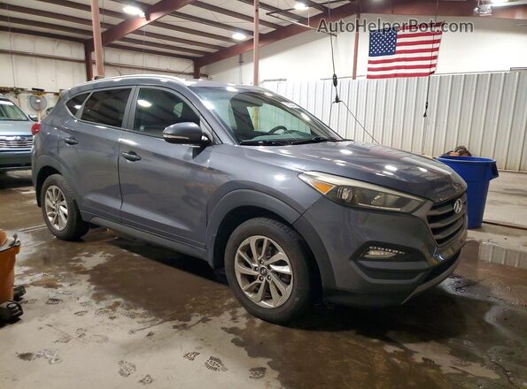 KM8J33A2XGU039271 2016 HYUNDAI TUCSON Gray Przód prawy