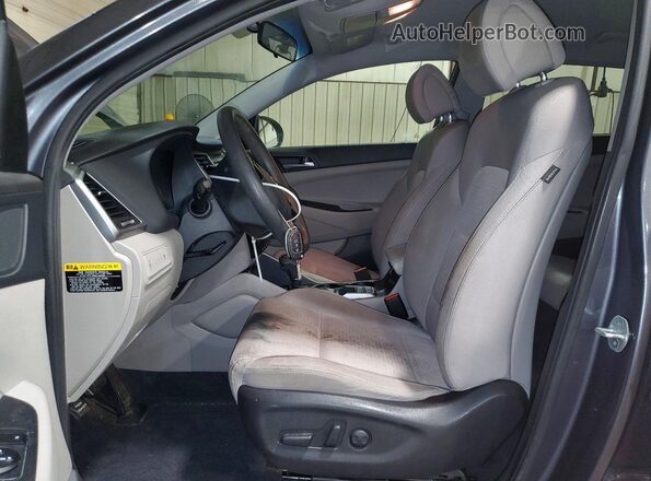 KM8J33A2XGU039271 2016 HYUNDAI TUCSON Gray Widok wnętrza z przodu