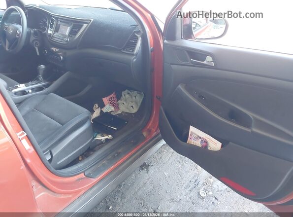 KM8J33A2XGU062761 2016 HYUNDAI TUCSON Orange Front interior view