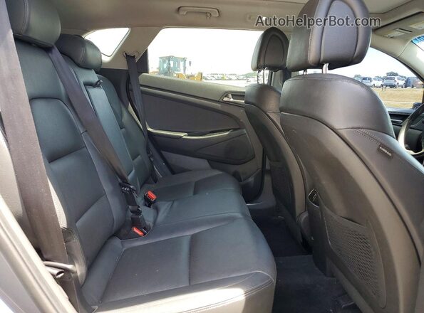 KM8J33A2XGU225473 2016 HYUNDAI TUCSON Gray Սալոնի հետևի տեսք