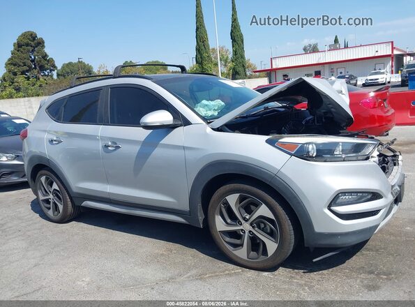 KM8J33A2XJU718884 2018 HYUNDAI TUCSON Silver Սալոնի հետևի տեսք