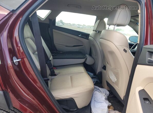 KM8J33A40HU413454 2017 HYUNDAI TUCSON Maroon უკანა სალონის ხედი