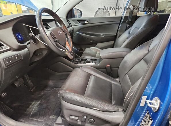 KM8J33A41HU451551 2017 HYUNDAI TUCSON Blue Widok wnętrza z przodu