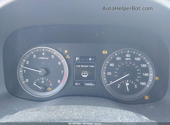 KM8J33A42GU144727 2016 HYUNDAI TUCSON Silver Rear seats view