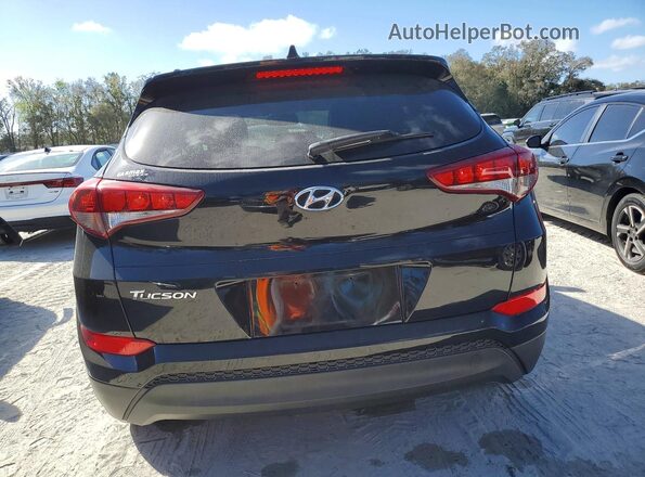 KM8J33A42JU653434 2018 HYUNDAI TUCSON Black Rear view