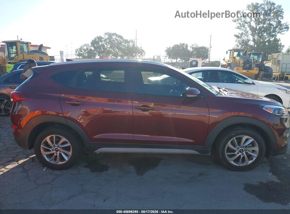 KM8J33A43HU492943 2017 HYUNDAI TUCSON Burgundy Rear interior view