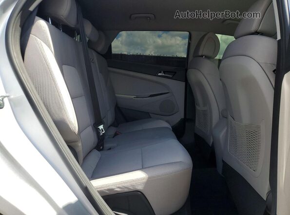 KM8J33A43JU654740 2018 HYUNDAI TUCSON Silver Vista interior trasera
