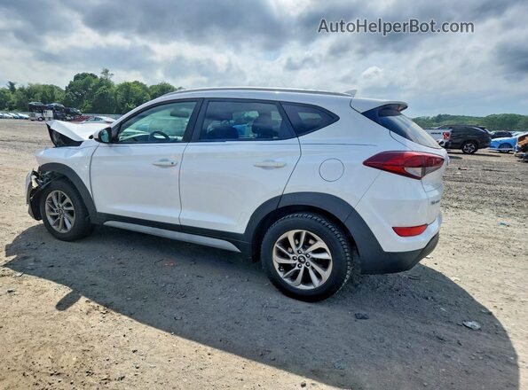 KM8J33A43JU692517 2018 HYUNDAI TUCSON White Trasero izquierdo