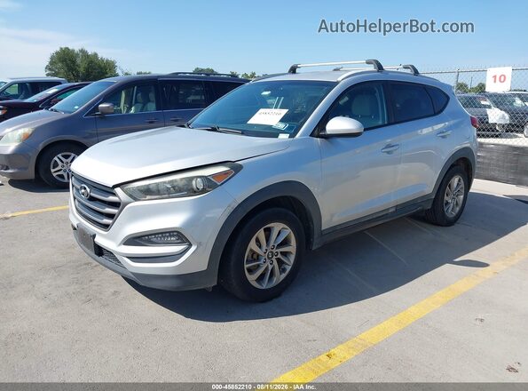 KM8J33A44GU076799 2016 HYUNDAI TUCSON Silver Առջևի ձախ երեք քառորդ տեսարան