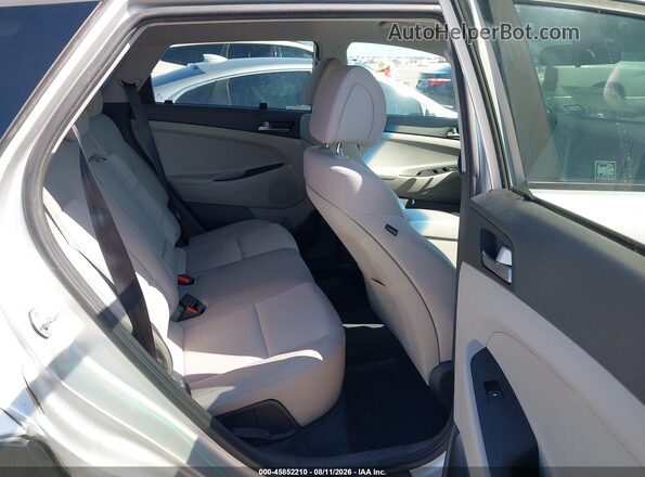 KM8J33A44GU076799 2016 HYUNDAI TUCSON Silver VIN կոդի պիտակի տեսք