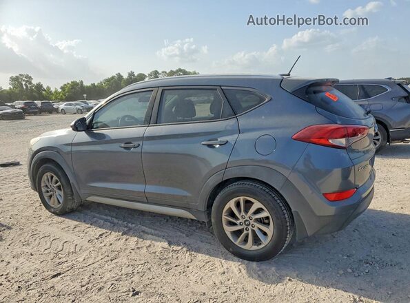 KM8J33A44HU266166 2017 HYUNDAI TUCSON Gray Trasero izquierdo