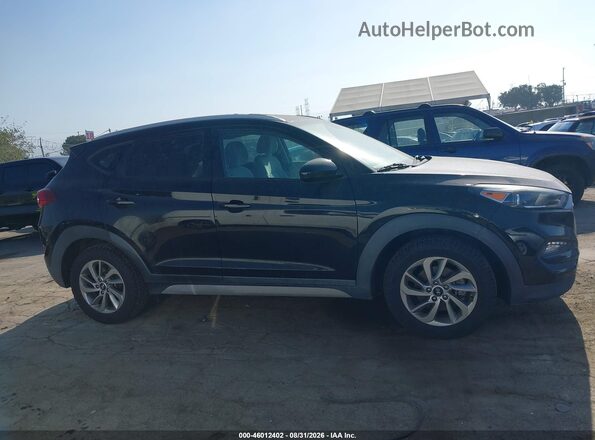KM8J33A44JU684863 2018 HYUNDAI TUCSON Black Вид задньої частини салону