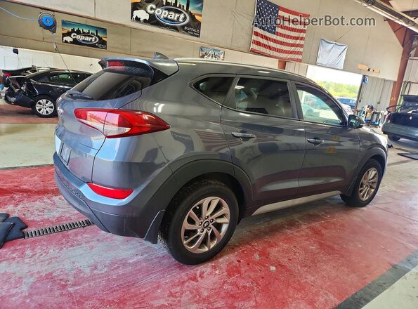 KM8J33A44JU800563 2018 HYUNDAI TUCSON Gray Rear right
