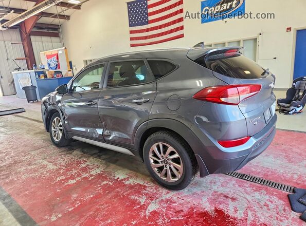 KM8J33A44JU800563 2018 HYUNDAI TUCSON Gray Rear left
