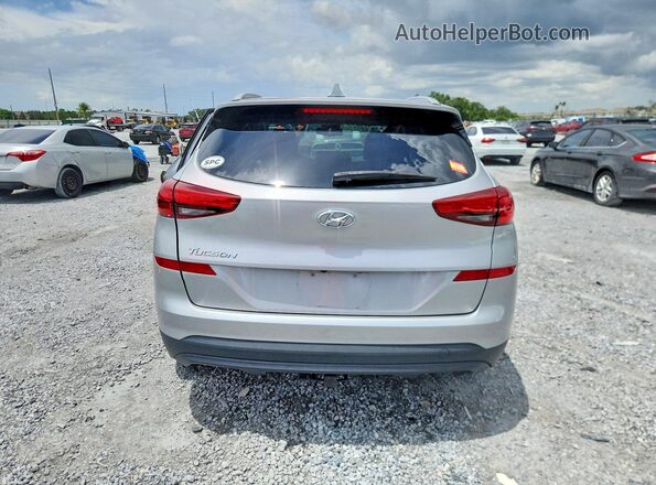 KM8J33A44LU101016 2020 HYUNDAI TUCSON Серебряный Вид сзади