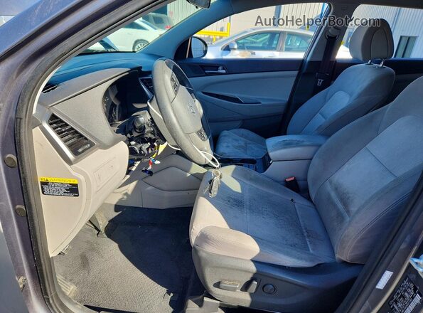 KM8J33A45GU071563 2016 HYUNDAI TUCSON Gray Vista interior delantera