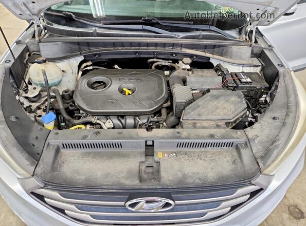 KM8J33A45GU090985 2016 HYUNDAI TUCSON Серебряный Вид подкапотного пространства