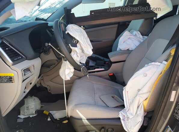 KM8J33A45JU608617 2018 HYUNDAI TUCSON Gray წინა სალონის ხედი