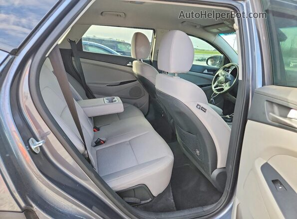 KM8J33A45KU056103 2019 HYUNDAI TUCSON Gray Vista interior trasera