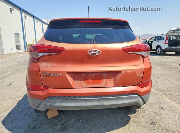 KM8J33A46GU063603 2016 HYUNDAI TUCSON Orange Widok z tyłu