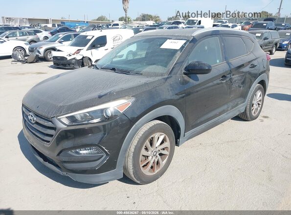 KM8J33A46GU092423 2016 HYUNDAI TUCSON Черный Передняя левая четверть