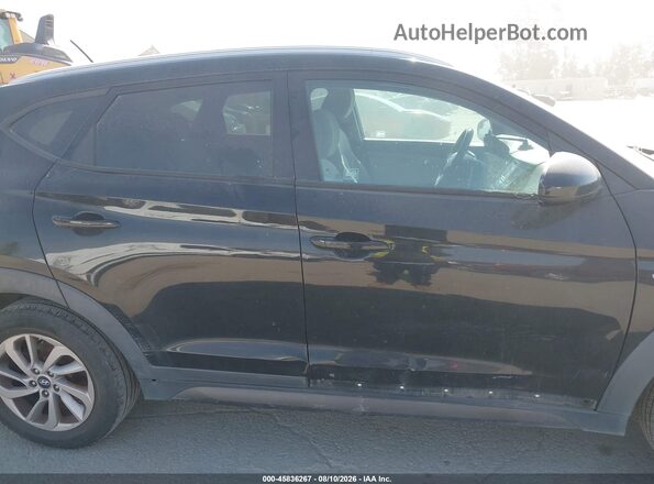 KM8J33A46GU092423 2016 HYUNDAI TUCSON Черный Вид задней части салона