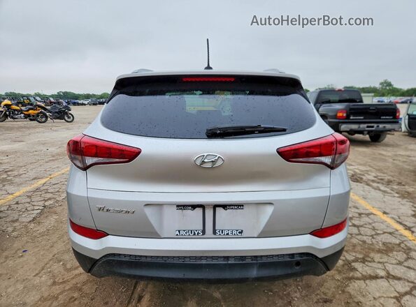 KM8J33A46GU100651 2016 HYUNDAI TUCSON Silver უკანა ხედი