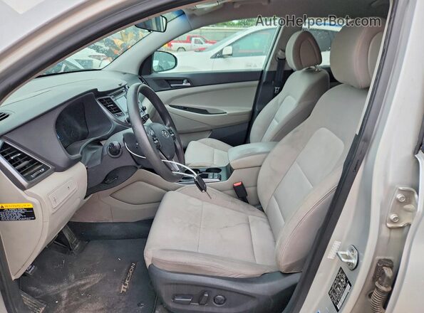 KM8J33A46GU100651 2016 HYUNDAI TUCSON Silver წინა სალონის ხედი
