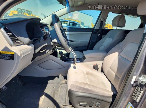 KM8J33A46GU139014 2016 HYUNDAI TUCSON Gray Vista interior delantera