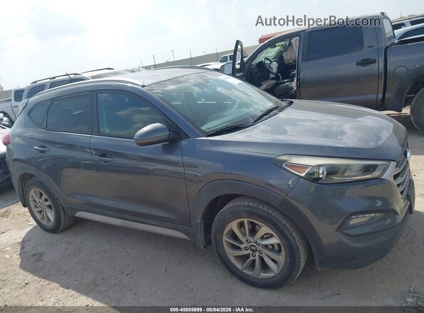 KM8J33A46HU462206 2017 HYUNDAI TUCSON Серый Вид задней части салона