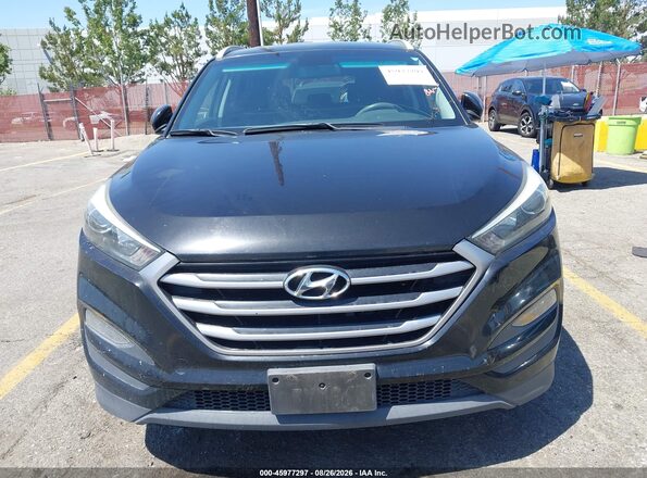 KM8J33A46JU754198 2018 HYUNDAI TUCSON Black ხელსაწყოთა პანელის ხედი