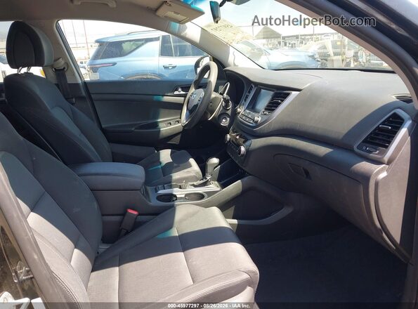 KM8J33A46JU754198 2018 HYUNDAI TUCSON Black წინა სალონის ხედი