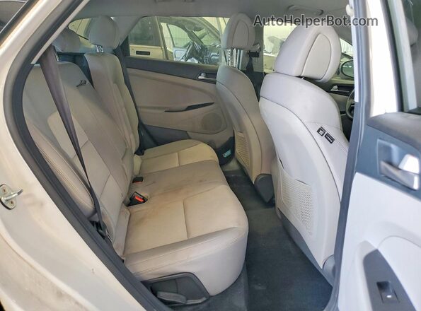 KM8J33A47HU409627 2017 HYUNDAI TUCSON White უკანა სალონის ხედი