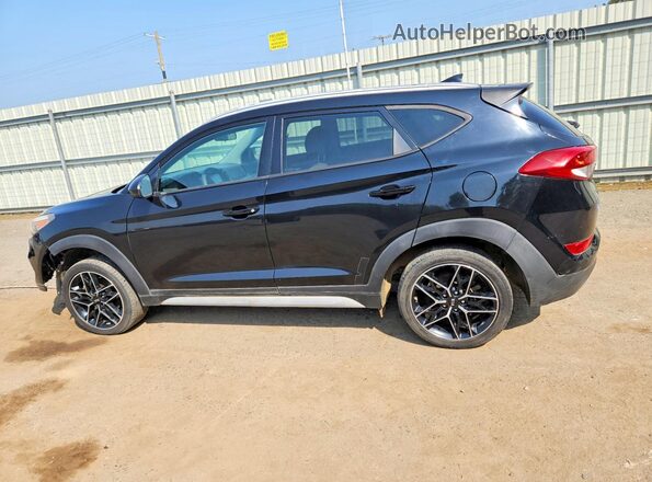 KM8J33A47JU653560 2018 HYUNDAI TUCSON Black Trasero izquierdo