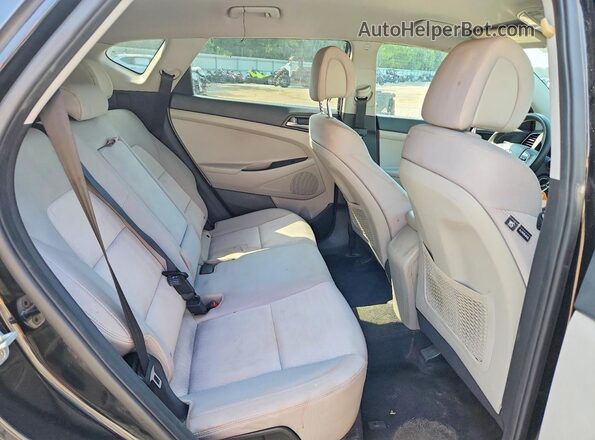 KM8J33A47JU653560 2018 HYUNDAI TUCSON Black Vista interior trasera