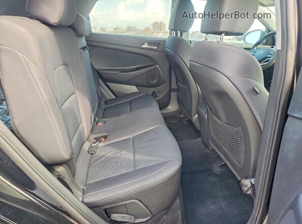 KM8J33A47KU021109 2019 HYUNDAI TUCSON Black Rear seats view