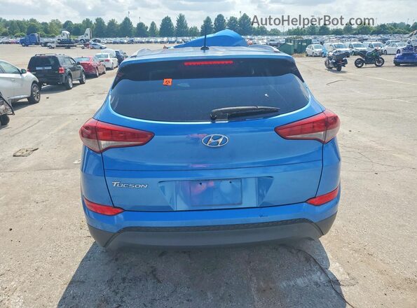 KM8J33A48GU101168 2016 HYUNDAI TUCSON Blue Widok z tyłu
