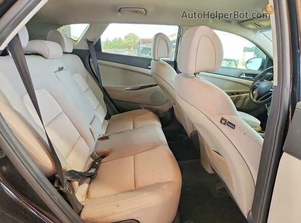 KM8J33A48HU385502 2017 HYUNDAI TUCSON Black Vista interior trasera