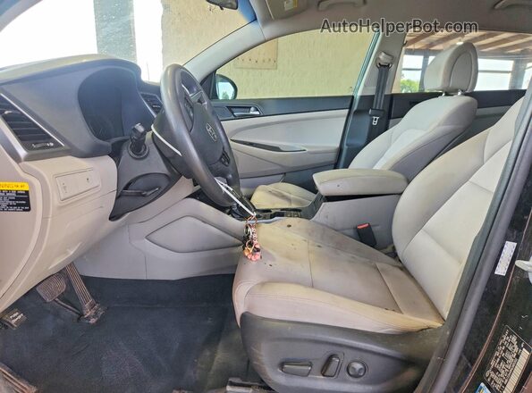 KM8J33A48HU385502 2017 HYUNDAI TUCSON Black Vista interior delantera