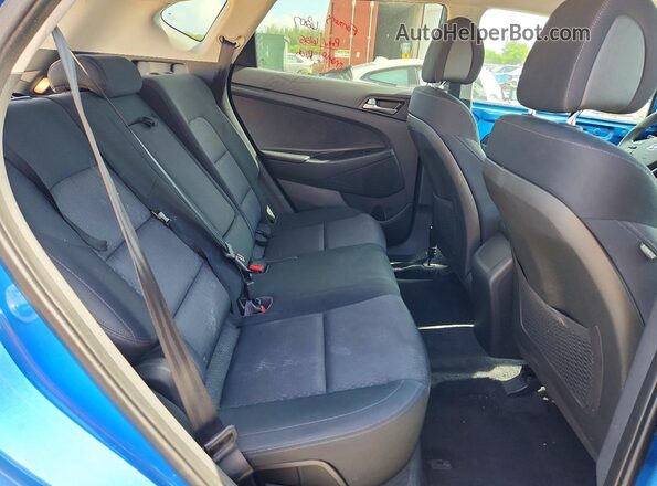 KM8J33A49GU116357 2016 HYUNDAI TUCSON Blue Rear interior view