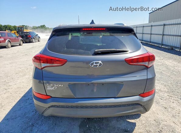 KM8J33A49JU600925 2018 HYUNDAI TUCSON Gray Հետևի տեսք