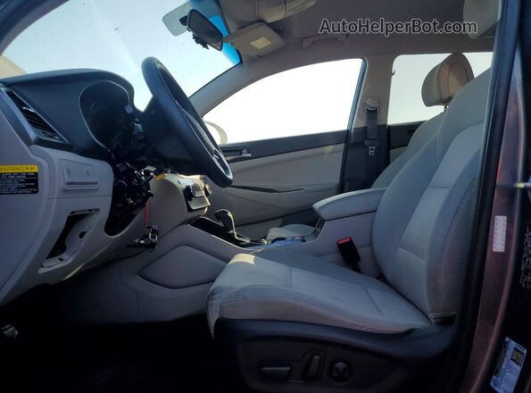 KM8J33A49JU618664 2018 HYUNDAI TUCSON Gray Вид салону спереду