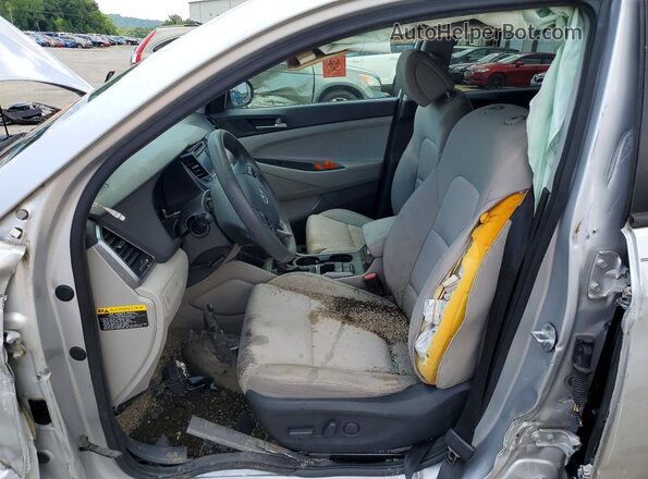 KM8J33A4XGU062423 2016 HYUNDAI TUCSON Серебряный Вид салона спереди