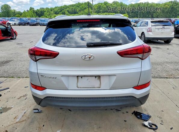 KM8J33A4XGU062423 2016 HYUNDAI TUCSON Серебряный Вид сзади